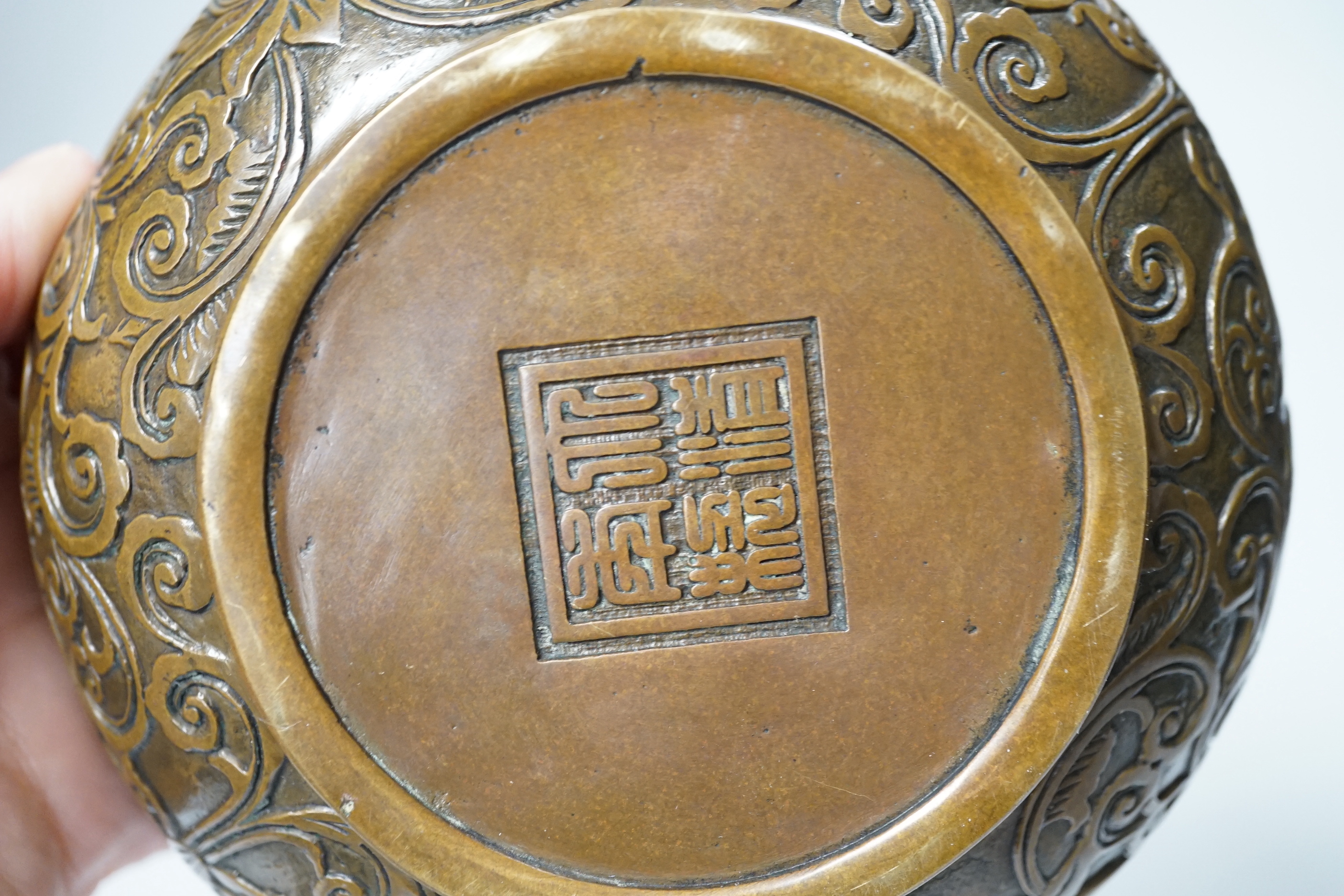 A Chinese circular cast bronze censer, 13.5cm diameter